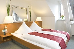 Zimmer mit Ehebett